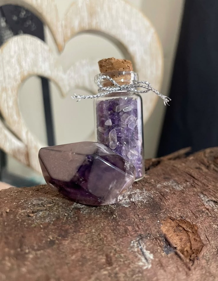 Amethyst chunk and bottle of amethyst chips