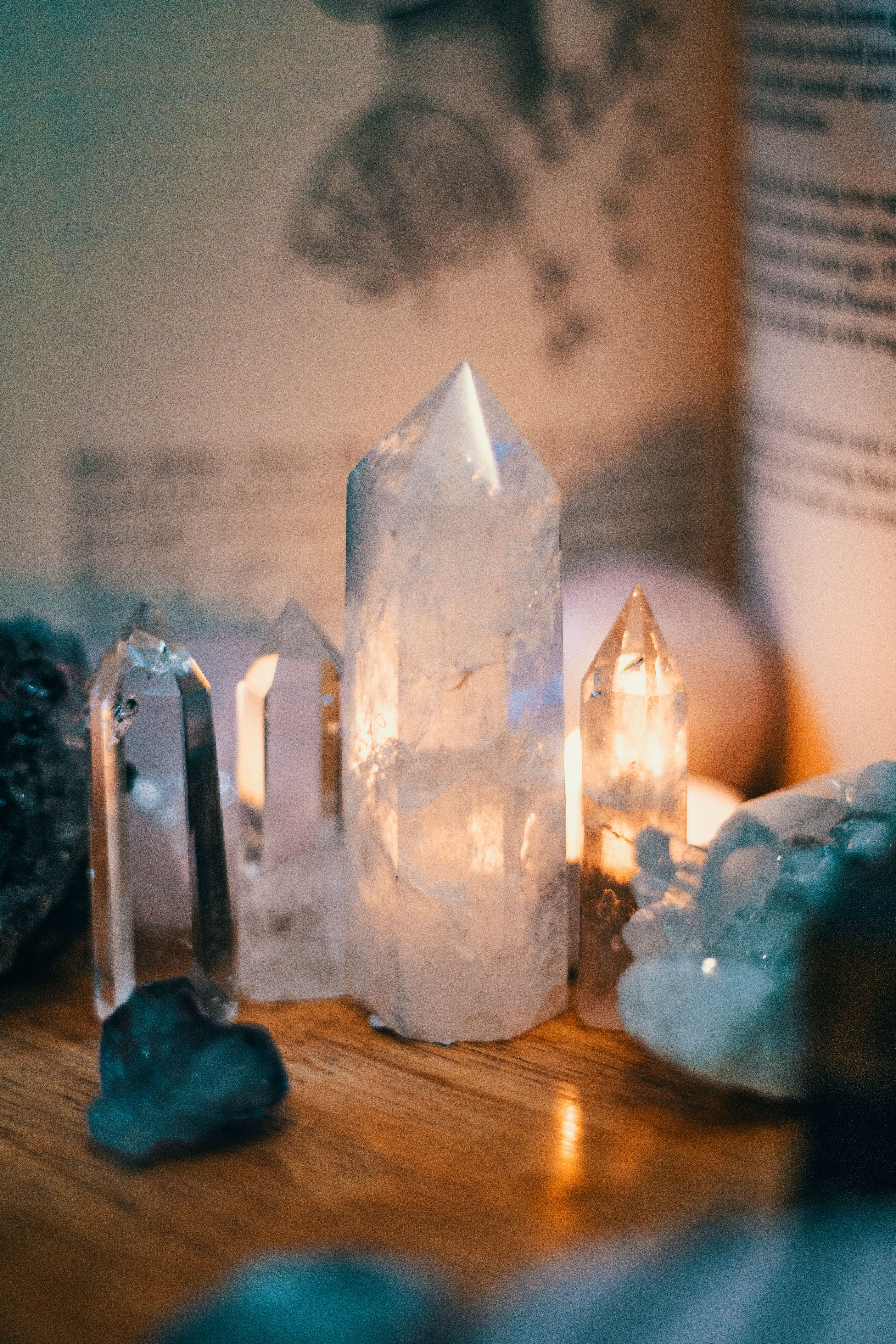 Clear quartz points glowing by candlelight